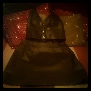 A vintage leather skirt and halter top, motorcycle
